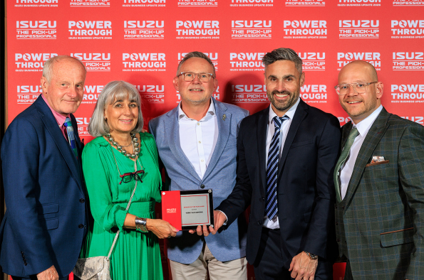 Far left, Tony Huggins plus York Van Centre team; centre Alan Able, MD of Isuzu UK